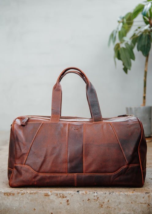 Resväska i läder mörkbrun - Corium
